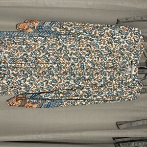 This is a full length, long sleeve dress.